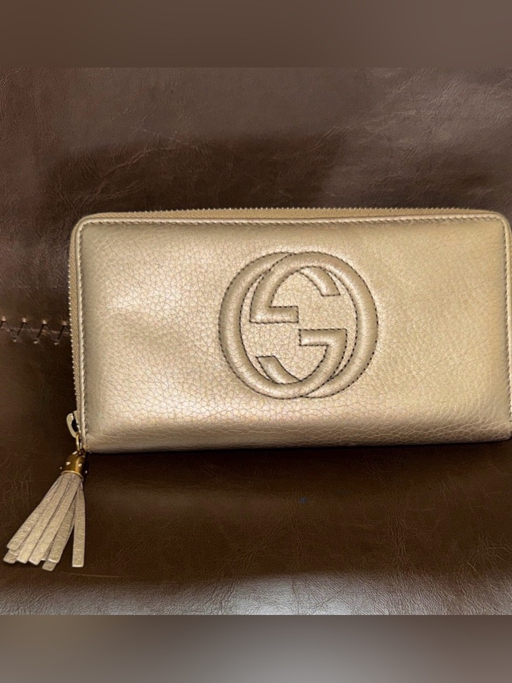 Gucci Metallic Gold Zip-Around Tassel Wallet